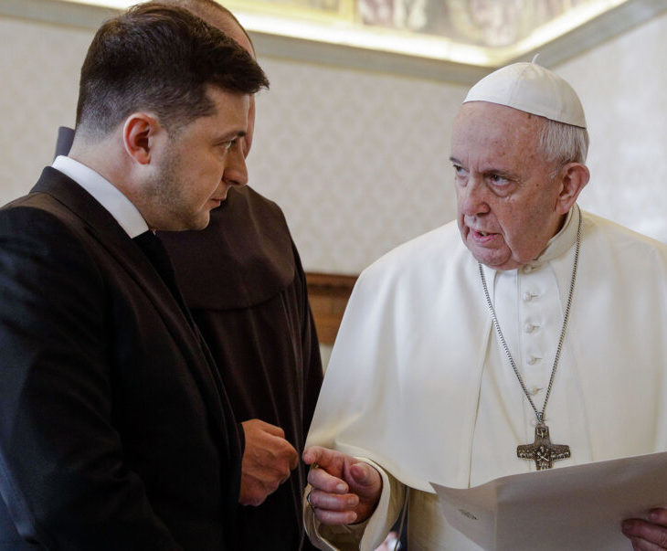 Zelenskyy on left speaks with Pope Francis on right
