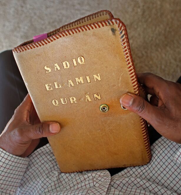 Wendell El-Amin James holds his favorite Qur'an. Its cover was made by another incarcerated man he knew when he was in prison. Photo: Tom Levy