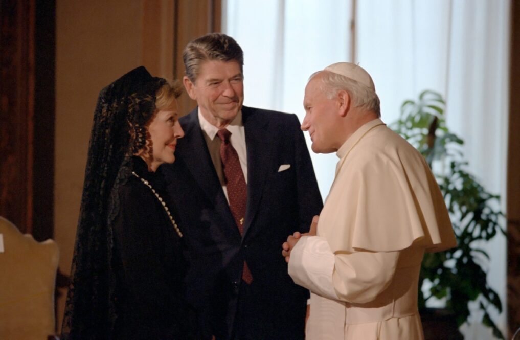 President Ronald Reagan and Nancy Reagan meeting with Pope John Paul II at The Papal Library Vatican Pontifical Palace during a visit to the Vatican in 1982. Official White House photo/Creative Commons