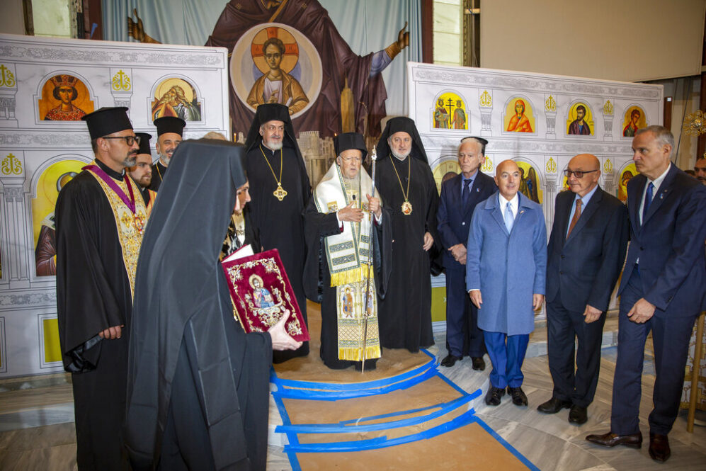 Ecumenical Patriarch Bartholomew leads the official door-opening ceremony of lower Manhattan's St. Nicholas Greek Orthodox Church. The old St. Nicholas church was the only house of worship destroyed during the 9/11 attacks when it was crushed beneath the falling south tower. (AP Photo/Ted Shaffrey)