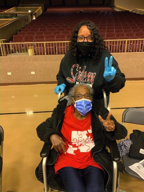 Michele Pullen, top, with Virdell Parker, 98, during a Salem Baptist Church vaccination event in Chicago in February 2021. Photo courtesy of Salem Baptist Church