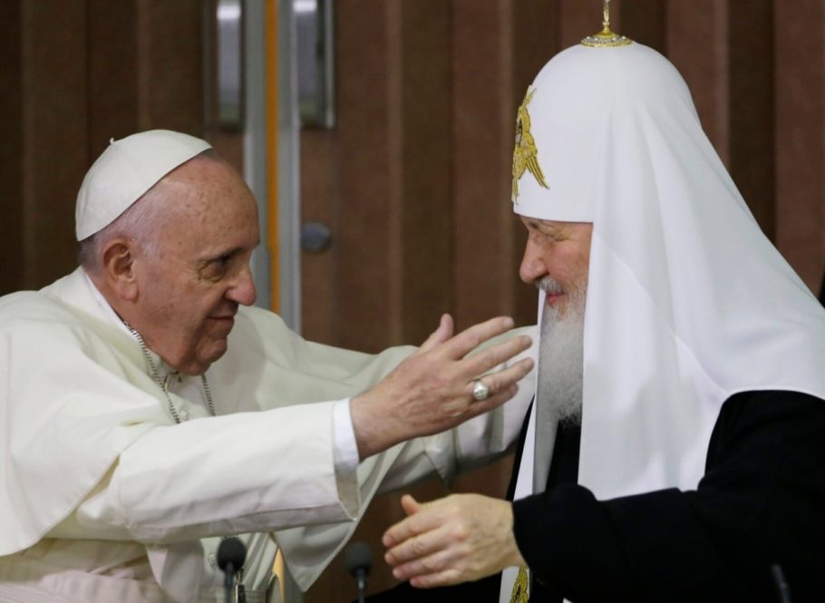 Pope Francis, left, reaches to embrace Russian Orthodox Patriarch Kirill after signing a joint declaration at the Jose Marti International airport in Havana on Feb. 12, 2016. (AP Photo/Gregorio Borgia, Pool, File)