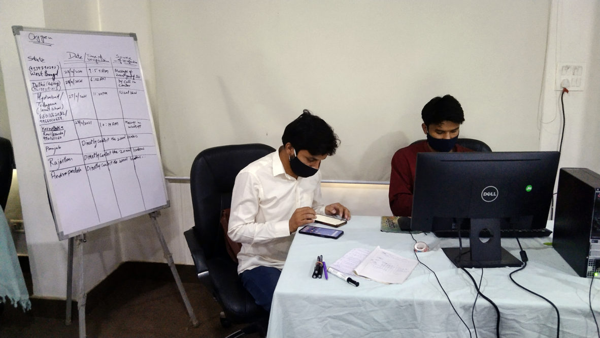 Volunteers with the Students Islamic Organization of India operate a 24-hour help line to connect patients across India with scarce resources, such as oxygen and plasma, in Delhi, India. Photo courtesy of Students Islamic Organization of India