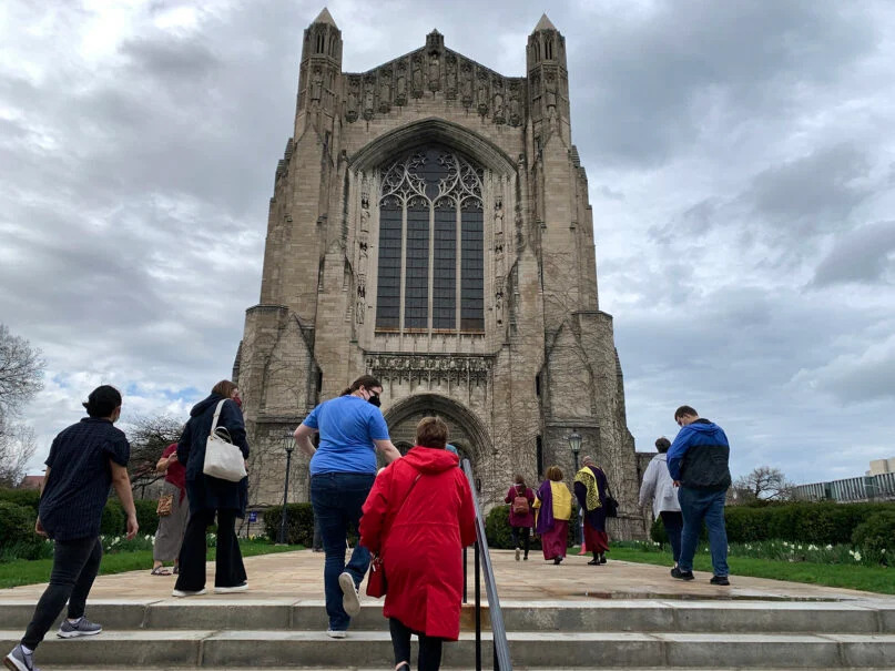 Chicago Interfaith Trolley Tour participants stop at Rockefeller Memorial Chapel at the University of Chicago. RNS photo by Bob Smietana