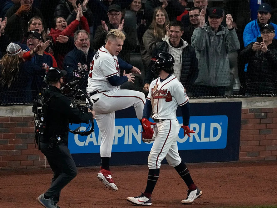 Atlanta Braves’ Dansby Swanson, right, celebrates his home run with Joc Pederson during the seventh inning in Game 4 of baseball’s World Series between the Houston Astros and the Atlanta Braves, Saturday, Oct. 30, 2021, in Atlanta. (AP Photo/John Bazemore)