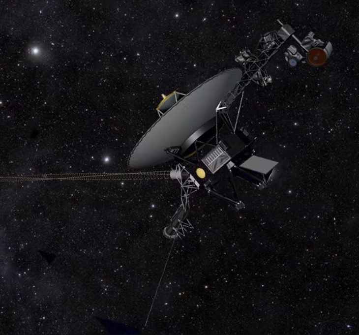 Voyager spacecraft in space with stars.
