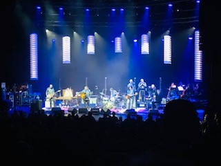 Stage with musicians and blue lights