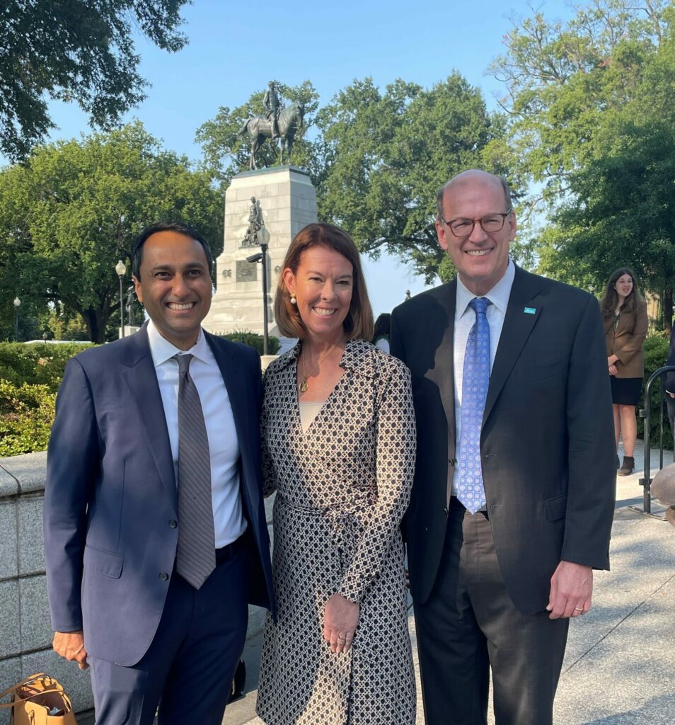 Jonathan Reckford (right) and Suzanne McCormick (center), chief executives of Habitat and the YMCA respectively, with Eboo Patel of Interfaith America (left) at the White House United We Stand Summit.