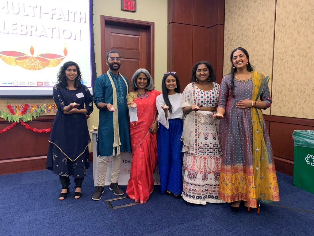 Hindus for Human Rights Staff hold lit diyas as part of their multi-faith Deepavali celebration on Capitol Hill. Photo courtesy of Harita Iswara