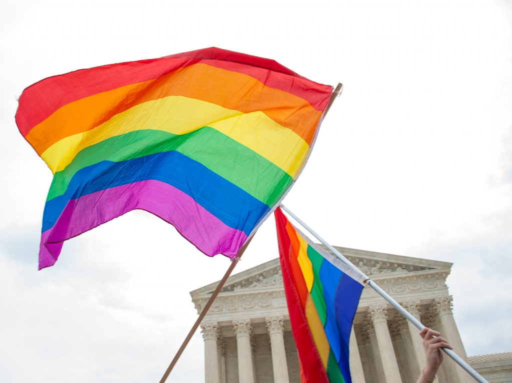 Gay pride flags at the U.S. Supreme Court (Rena Schild/Shutterstock)