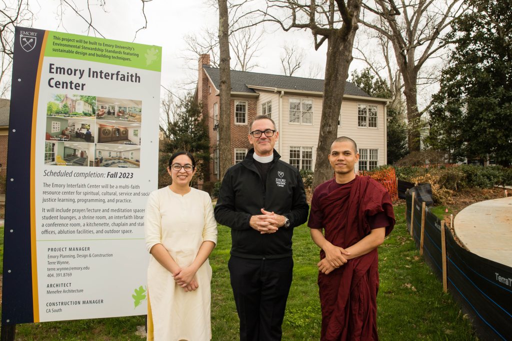 Brahmacharini Shweta Chaitanya (left), the Rev. Dr. Greg McGonigle (center), and The Venerable Priya Sraman (right) in front of Emory University's new Interfaith Center which is under construction in Atlanta, Georgia, February 24, 2023. (Atlanta Event Photography)