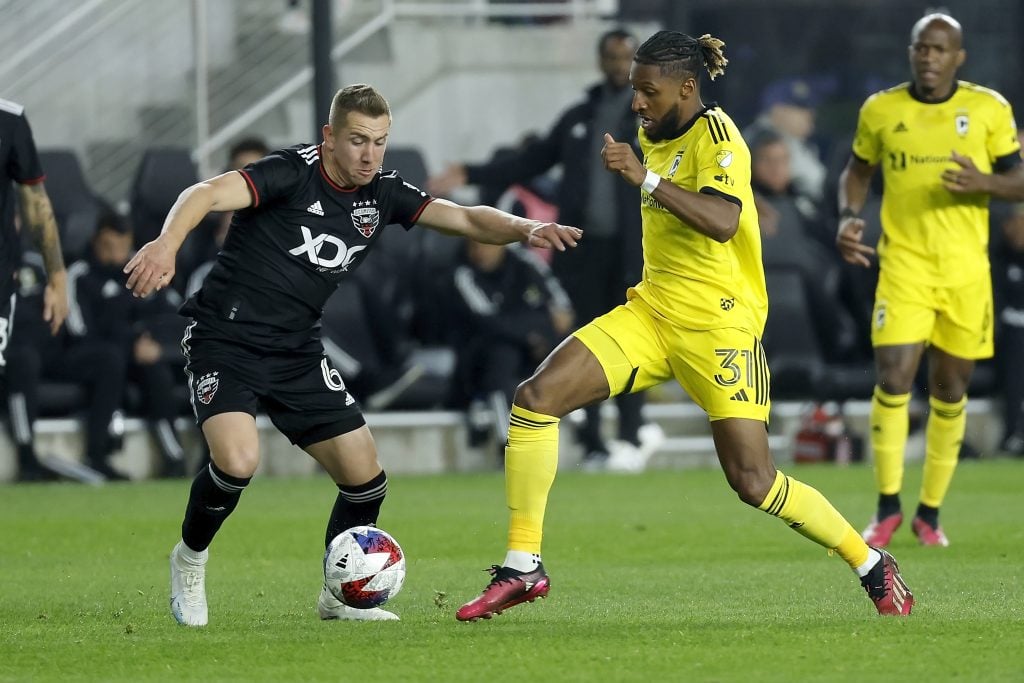 COLUMBUS, OH - MARCH 04:  Russell Canouse #6 of DC United and Steven Moreira #31 of the Columbus Crew compete for a loose ball during the second half of the match at Lower.com Field on March 4, 2023 in Columbus, Ohio. Columbus defeated DC 2-1. (Photo by Kirk Irwin/Getty Images)