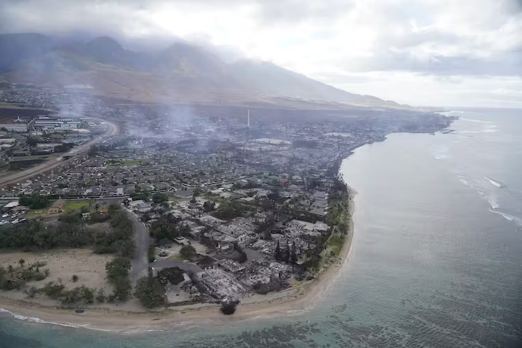 A view of the devastation in Lahaina, Hawaii, following the wildfires in August 2023. AP Photo/Rick Bowmer via The Conversation