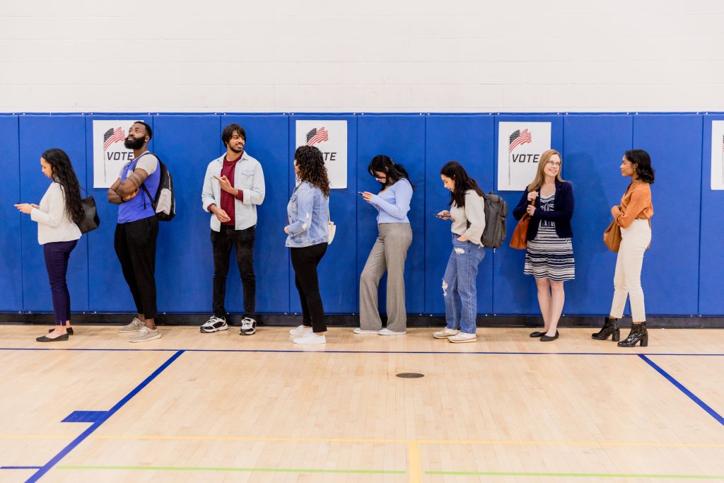 Group of voters stand in line at the community center so they can participate in early voting. (SDI Productions/Getty Images)