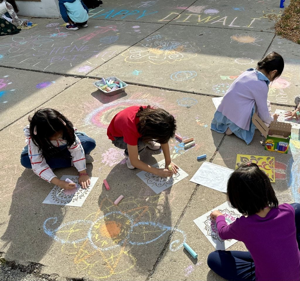Diwali rangoli chalk art as an optional recess activity outside of a school. (Courtesy Photo from Smita Garg)