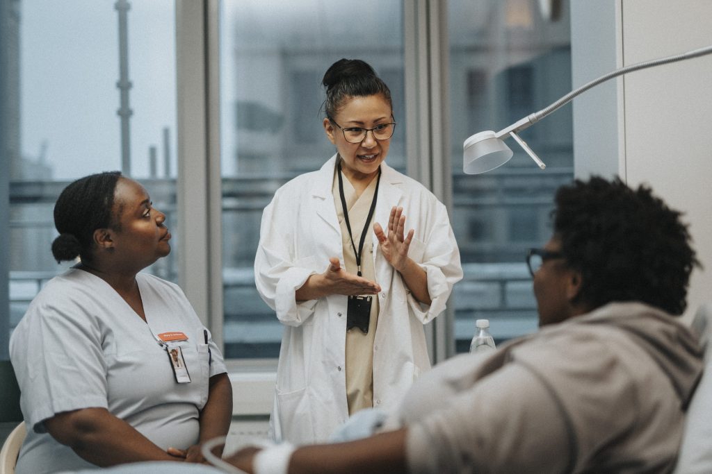 Doctor explaining patient during visit in hospital. (Maskot/Getty Images)