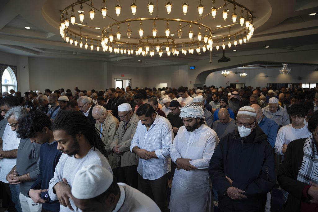 Muslim community members gather for the Jumʿah, a special noon service on Fridays that observant Muslims are obliged to attend, Friday, March 15, 2024, at the Islamic Society of Central Jersey in Monmouth Junction, N.J. (AP Photo/John Minchillo)