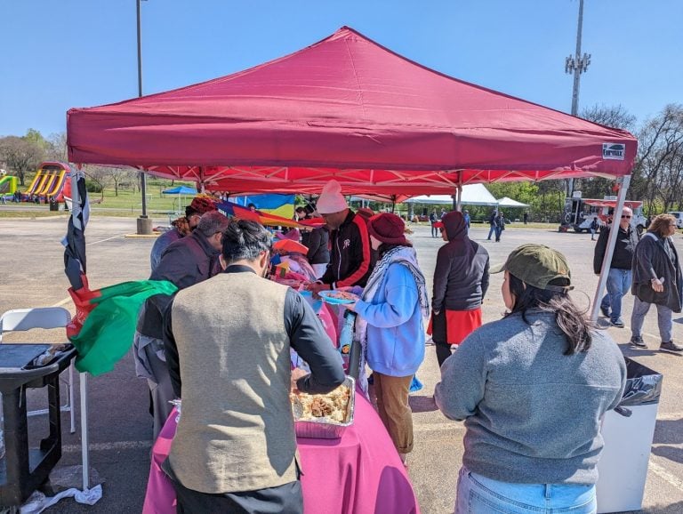 The Afghan booth serves food even as servers fast for Ramadan