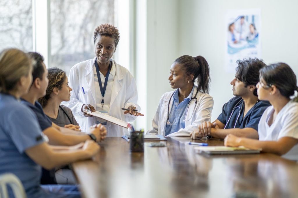 A group of nursing students in a classroom. (FatCamera/Getty Images)