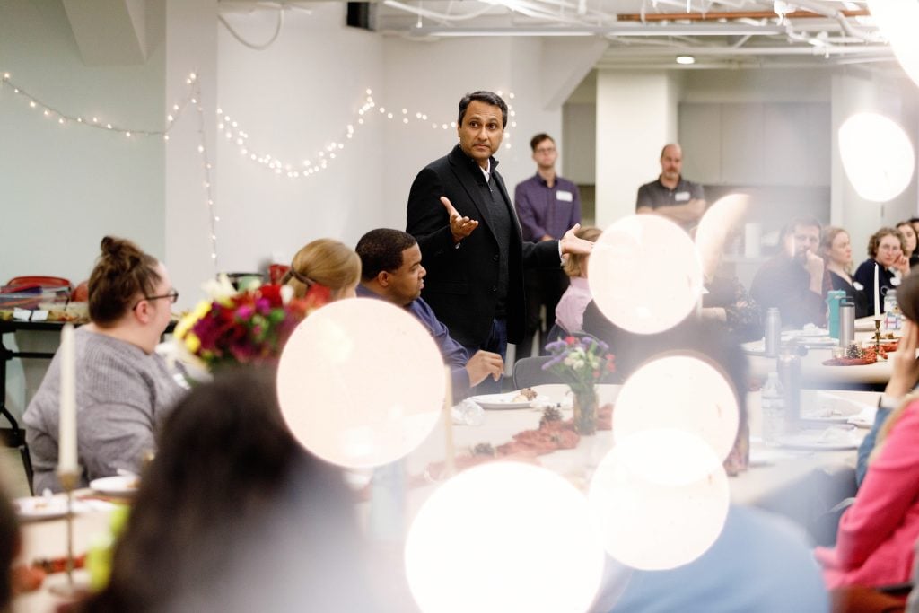Eboo Patel speaking at the 2024 Interfaith America Thanksgiving Potluck.