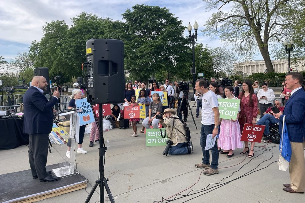 Wael Elkoshairi, left, addresses supporters of opt-out options, after oral arguments in the Mahmoud v. Taylor case, at the Supreme Court in Washington, D.C., Tuesday, April 22, 2025.  (Photo by Reina Coulibaly)