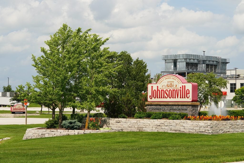 Sheboygan Falls, Wisconsin USA - July 4th, 2025: Johnsonville sausage manufacturing and food production company headquarters in Sheboygan Falls, Wis. Founded in 1945, by Ralph F. and Alice Stayer. (Aaron of L.A. Photography/Shutterstock)
