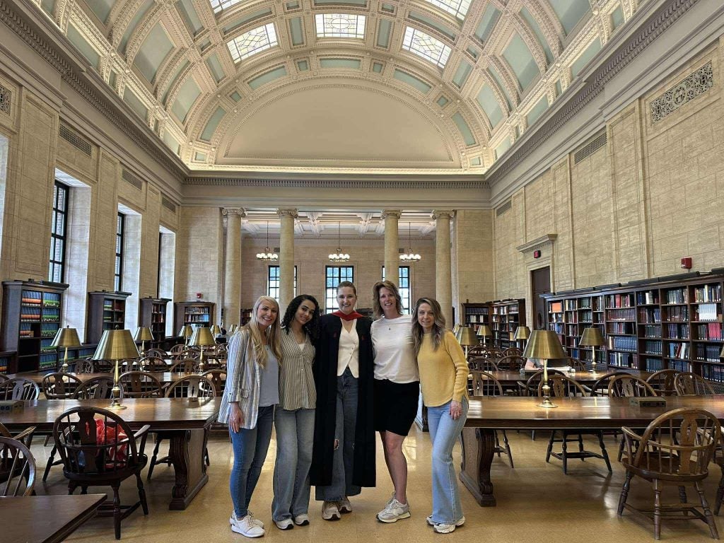 Celebrating Abbie's master's program graduation in spring 2025 with sisters Irma and Dijana, mom Ericka, and niece Lamaya. (Courtesy Photo)