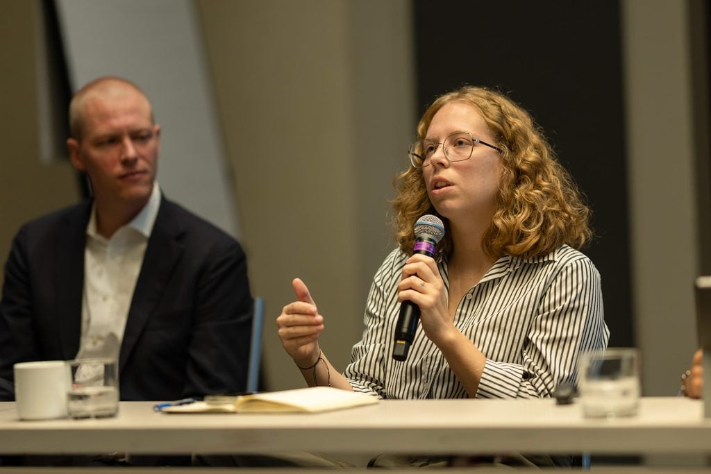Jax Collins speaks on the "Navigating Faith in the Workplace" panel at the 2025 Interfaith Leadership Summit.