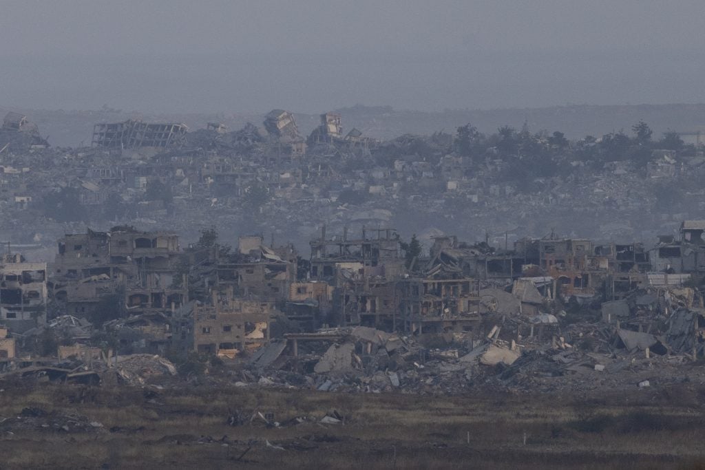 SOUTHERN ISRAEL, ISRAEL - MAY 22: A view over the Gaza Strip as seen from a position on the Israeli side of the border on May 22, 2025 in Kerem Shalom, Israel. Despite Israel lifting an 11-week humanitarian aid blockade of Gaza, the UN said Wednesday that no aid had reached Palestinians in Gaza. Israeli Prime Minister Benjamin Netanyahu has been under increasing international pressure to end the blockade and airstrikes, as reports of starvation and devastation have filtered out of Gaza. Earlier this week, the Israeli military said it was expanding ground operations in Gaza as part of what it's calling 'Operation Gideon's Chariots,' aimed at securing the release of hostages still held in Gaza, as well as "the defeat of Hamas." (Photo by Amir Levy/Getty Images)