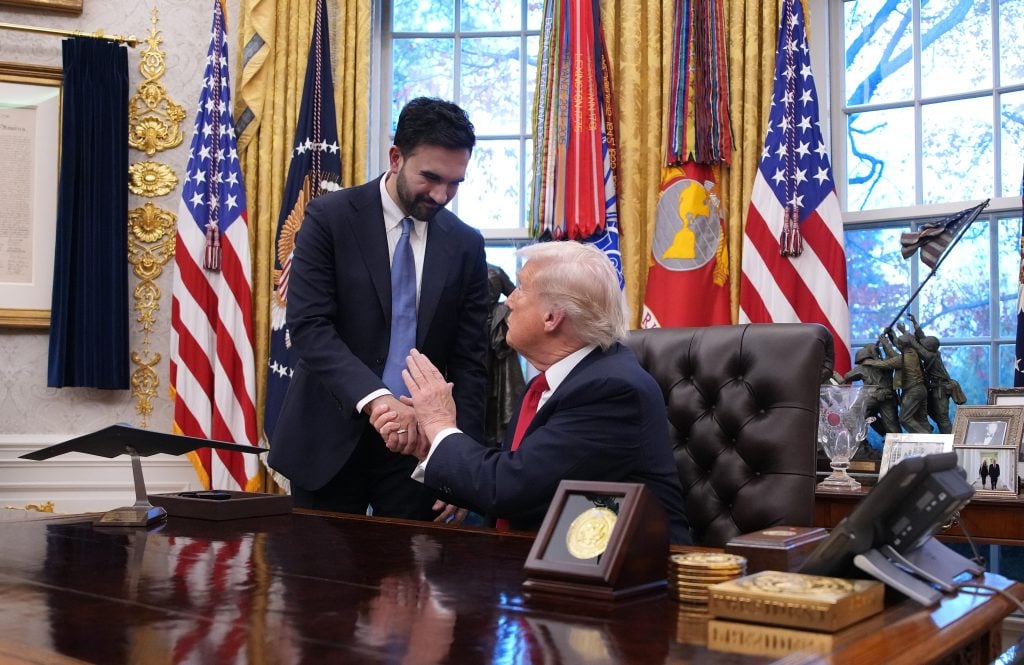 WASHINGTON, DC - NOVEMBER 21: U.S. President Donald Trump shakes hands with New York City Mayor-elect Zohran Mamdani (L) during a meeting in the Oval Office of the White House on November 21, 2025 in Washington, DC. Trump congratulated Mamdani on his election win as the two political opponents met to discuss policies for New York City, including affordability, public safety, and immigration enforcement. (Photo by Andrew Harnik/Getty Images)