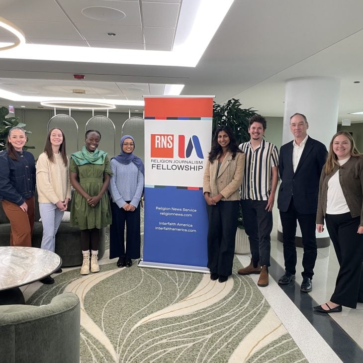 The 2025-26 Religion News Service and Interfaith America staff and religion journalism fellows pose for a photo.