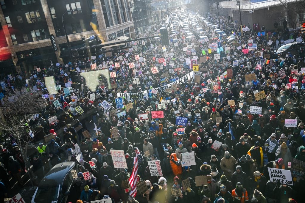 MINNEAPOLIS, MINNESOTA - JANUARY 23: Demonstrators participate in a rally and march during an "ICE Out” day of protest on January 23, 2026 in Minneapolis, Minnesota. Community leaders, faith leaders and labor unions have urged Minnesotans to participate in what they are calling a "day of action" as local businesses are expected to close during a statewide general strike held in protest against immigration enforcement operations in the region. (Photo by Brandon Bell/Getty Images)