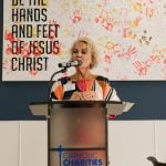 Catholic Charities of Omaha’s Executive Director, Denise Bartels, speaks at "From Bread to Bridges."