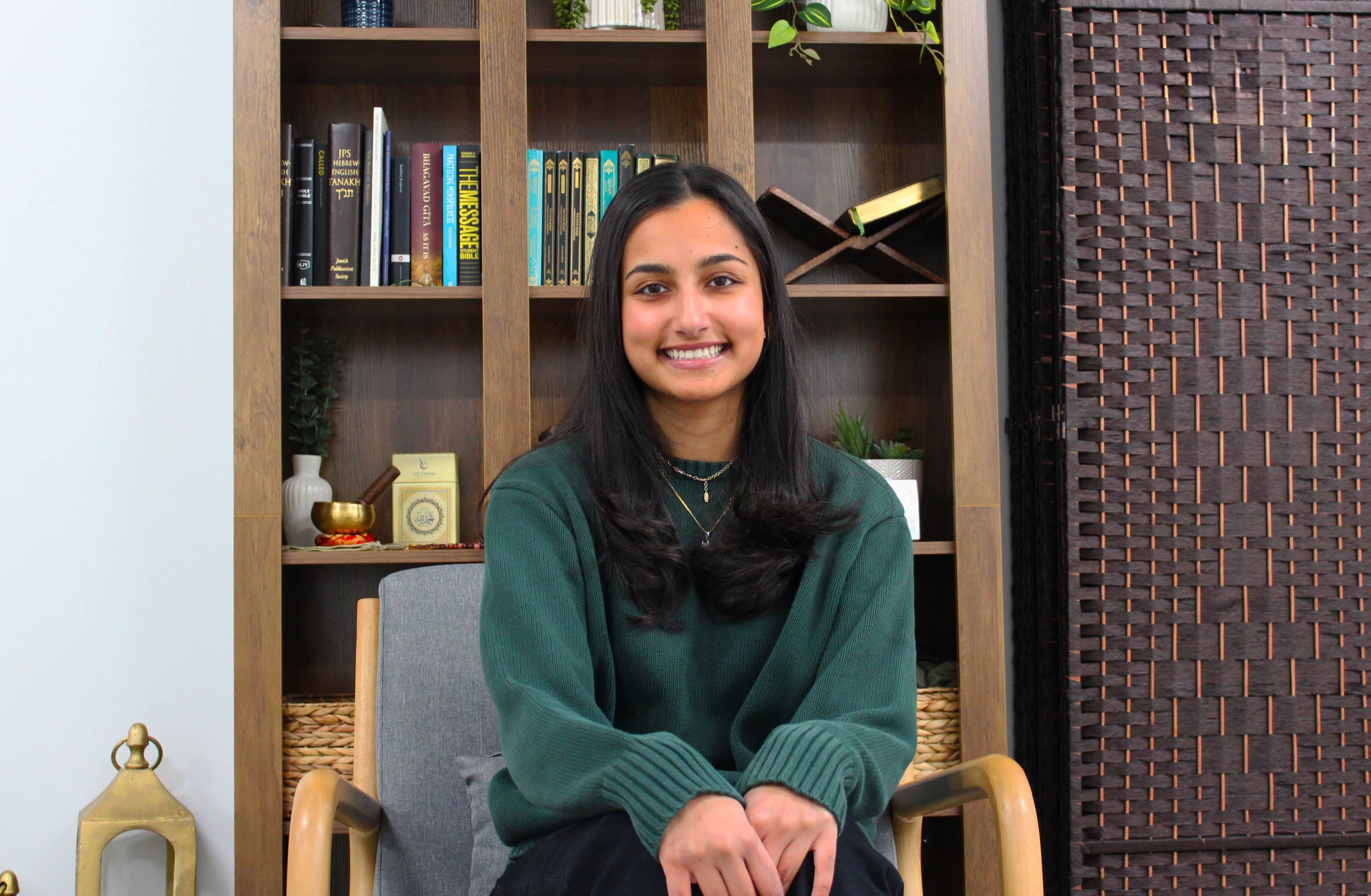 Sabeen Safi sits in Muhlenberg College's new interfaith space. (Courtesy Photo)