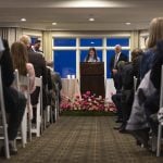 WEST BLOOMFIELD, MICHIGAN - MARCH 13: Sydney Cox speaks during her Bat Mitzvah service at Tam O'Shanter Country Club on March 13, 2026 in West Bloomfield, Michigan. The ceremony was moved from Temple Israel after a gunman rammed a vehicle into the synagogue and opened fire yesterday. (Photo by Emily Elconin/Getty Images)