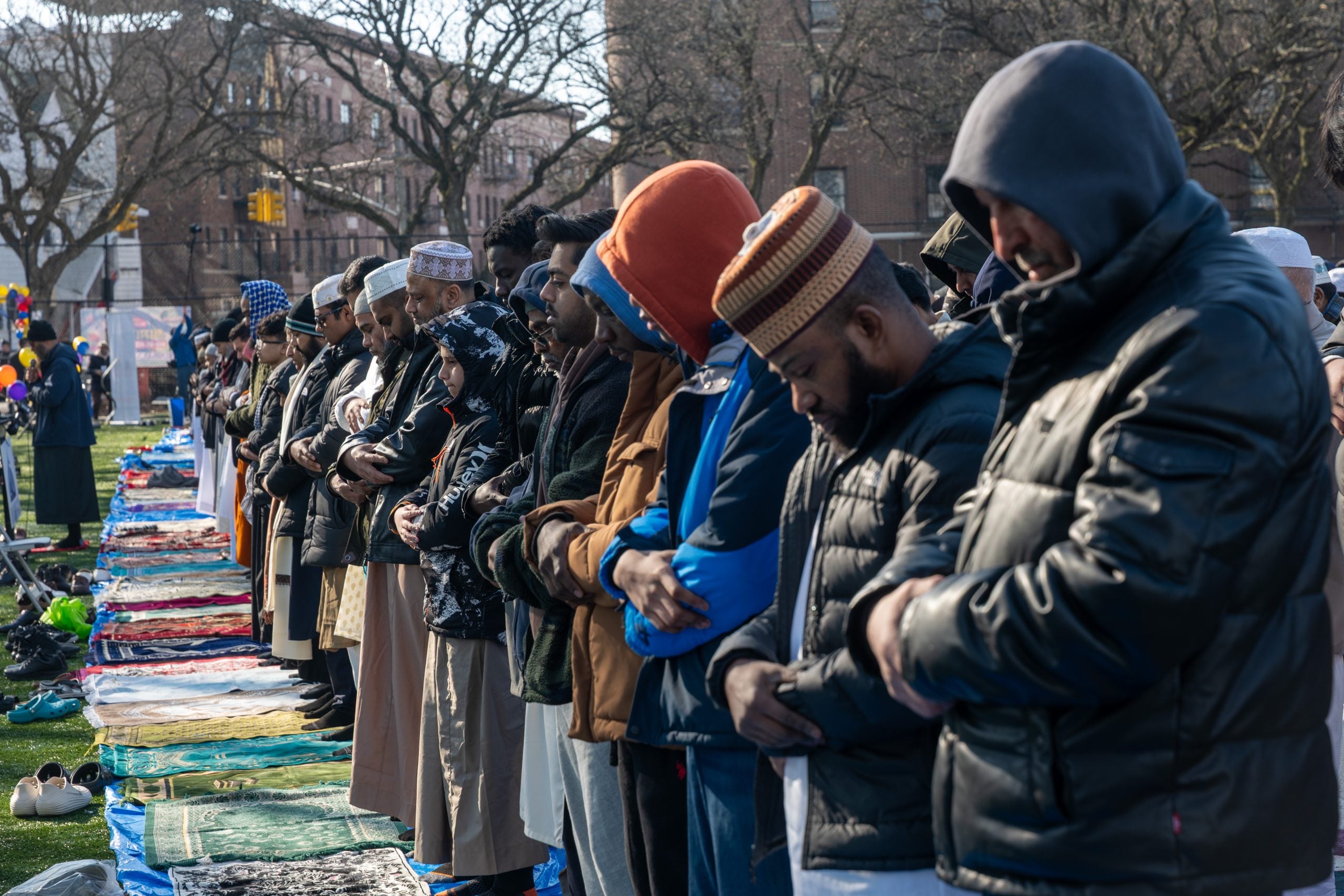 NEW YORK, NEW YORK - MARCH 20: People attend Eid al-Fitr prayers at Brooklyn's Prospect Park on March 20, 2026, in New York City. Hundreds of area Muslims attended the morning service, including New York City Mayor Zohran Mamdani, which marks the end of the Islamic month of Ramadan. Around the world, people are celebrating the holiday as millions of Muslims in the Middle East are living in countries upended after the United States and Israel had launched strikes on Iran, which has resulted in retaliatory Iranian attacks across the region. (Photo by Spencer Platt/Getty Images)