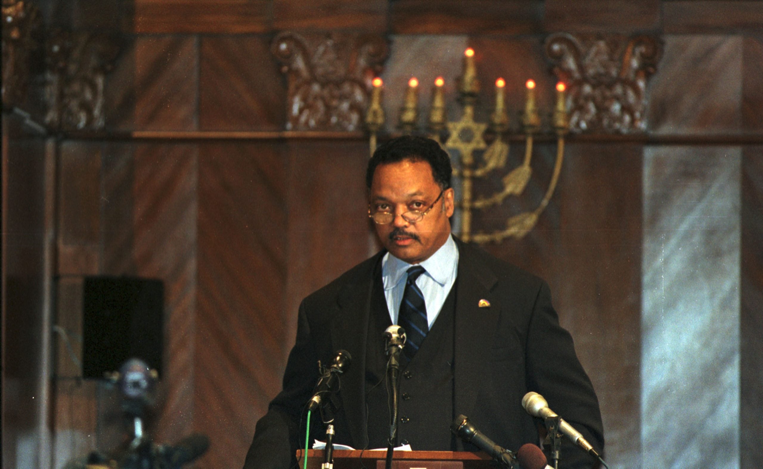 Rev. Jesse Jackson speaks about election day irregularities November 12, 2000 at the Temple Israel of Greater Miami in Miami, Florida. (Photo by Robert King/ Newsmakers)