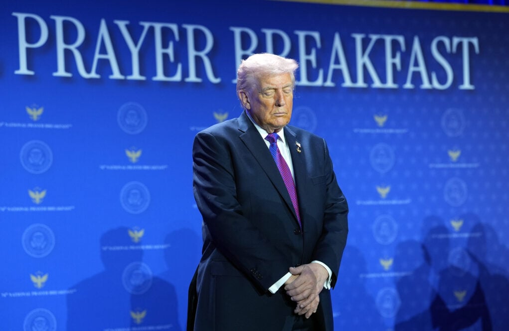 President Donald Trump bows his head during the National Prayer Breakfast, Thursday, Feb. 5, 2026, in Washington. (AP Photo/Evan Vucci)