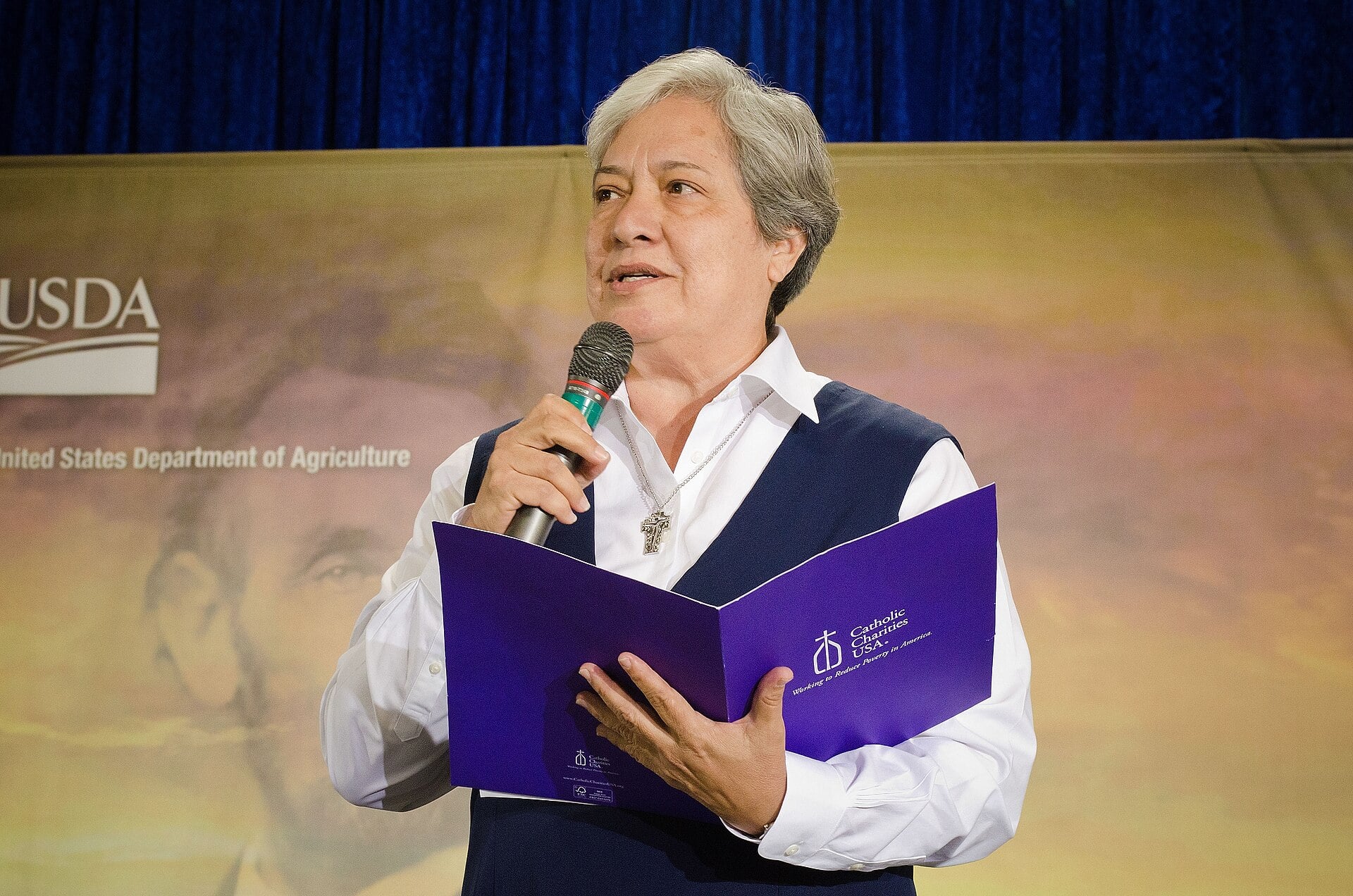 Sister Norma Pimentel Catholic Charities of the Rio Grande Valley in the Diocese of Brownsville, TX gives the invocation at the opening of the United States Department of Agriculture 150th Anniversary celebration in Washington, DC Tuesday, May 15, 2012. USDA photo by Bob Nichols.