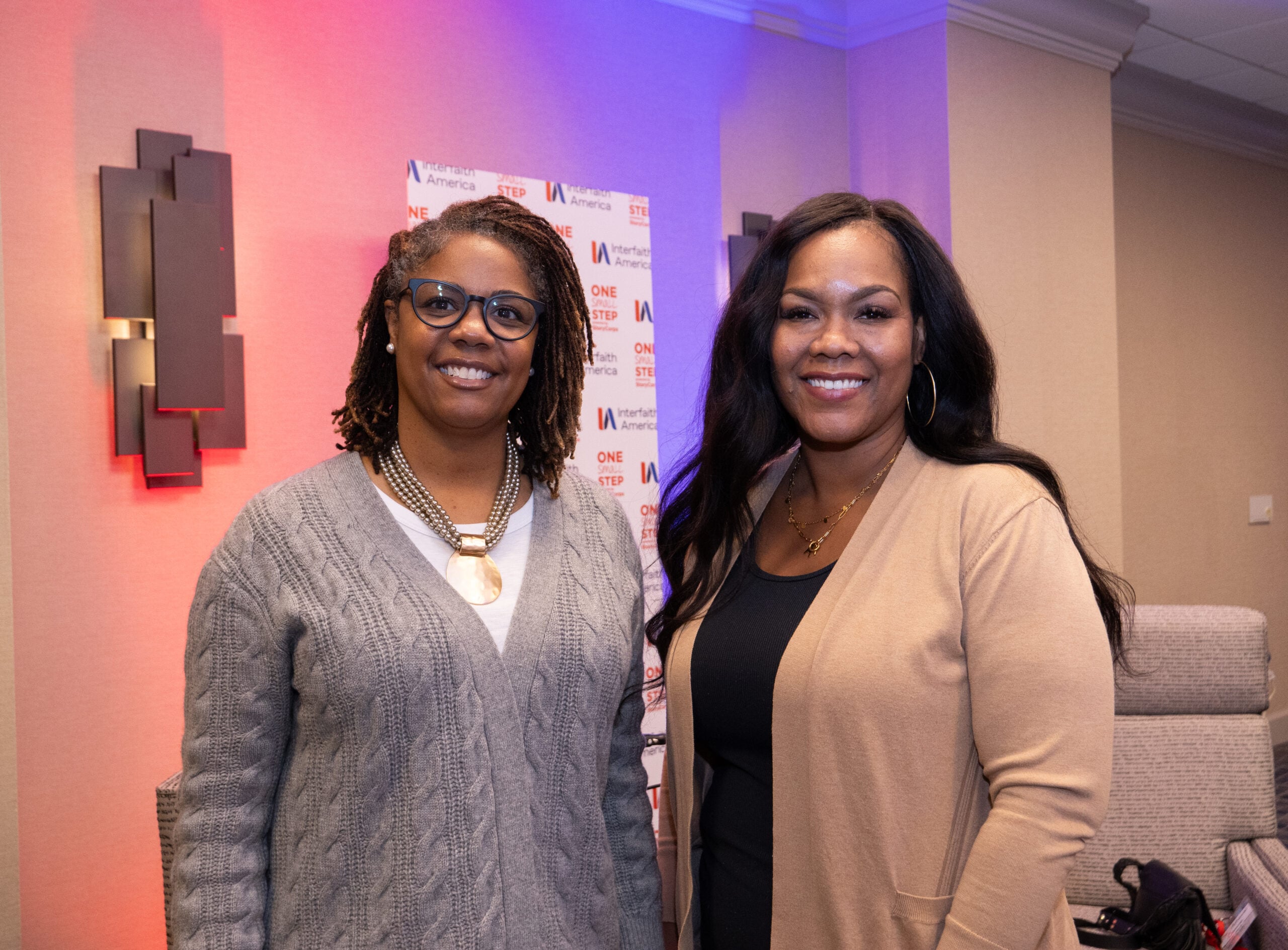 Kishia James (left) and Ashante Connor (right) at the StoryCorps conversation at the 2025 Interfaith Leadership Summit in Chicago, Illinois. (Alex Myung)
