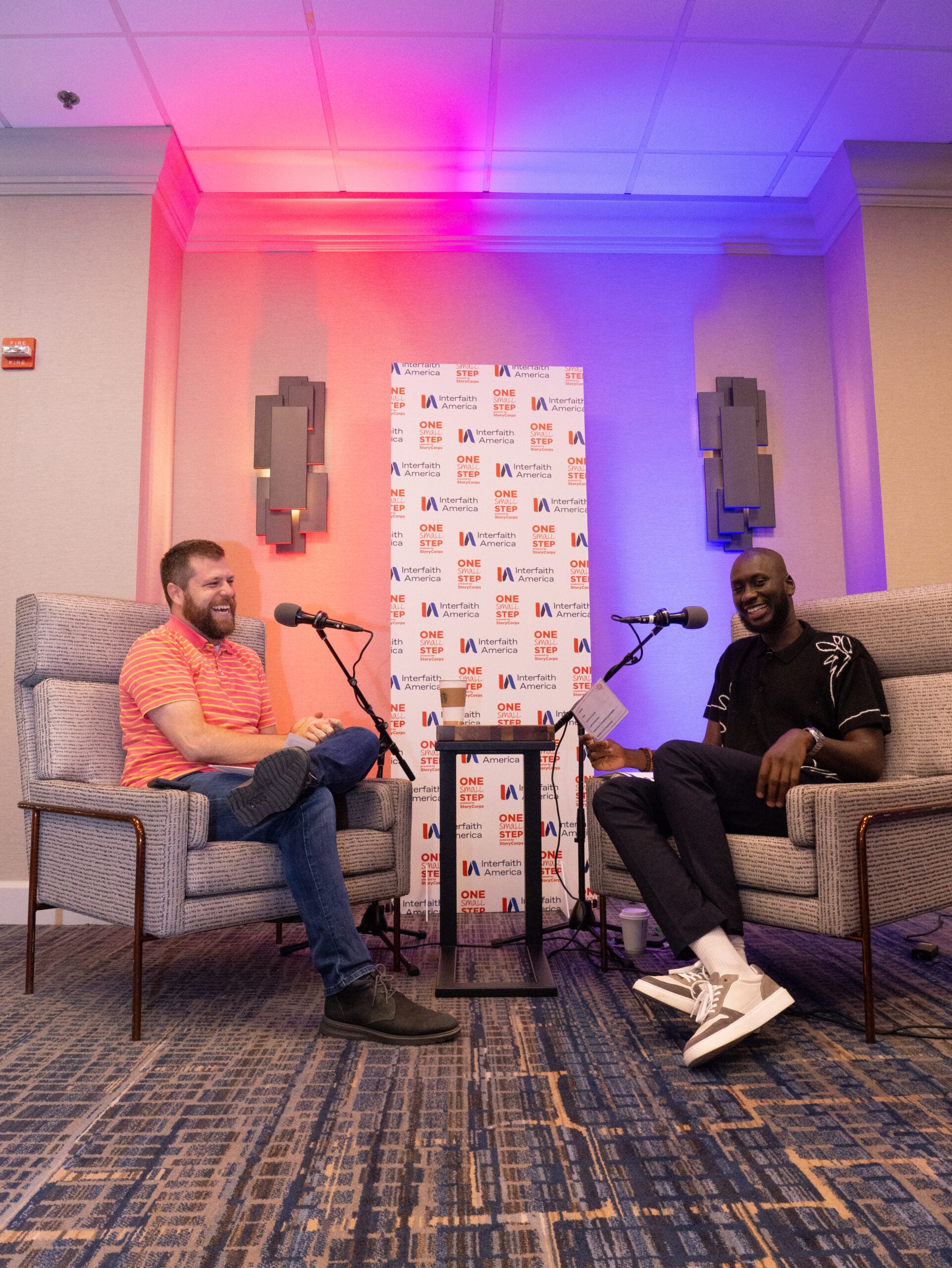 Joey Haynes (left) and Seedy Njie (right) at their StoryCorps conversation at the 2025 Interfaith Leadership Summit in Chicago, Illinois. (Alex Myung)