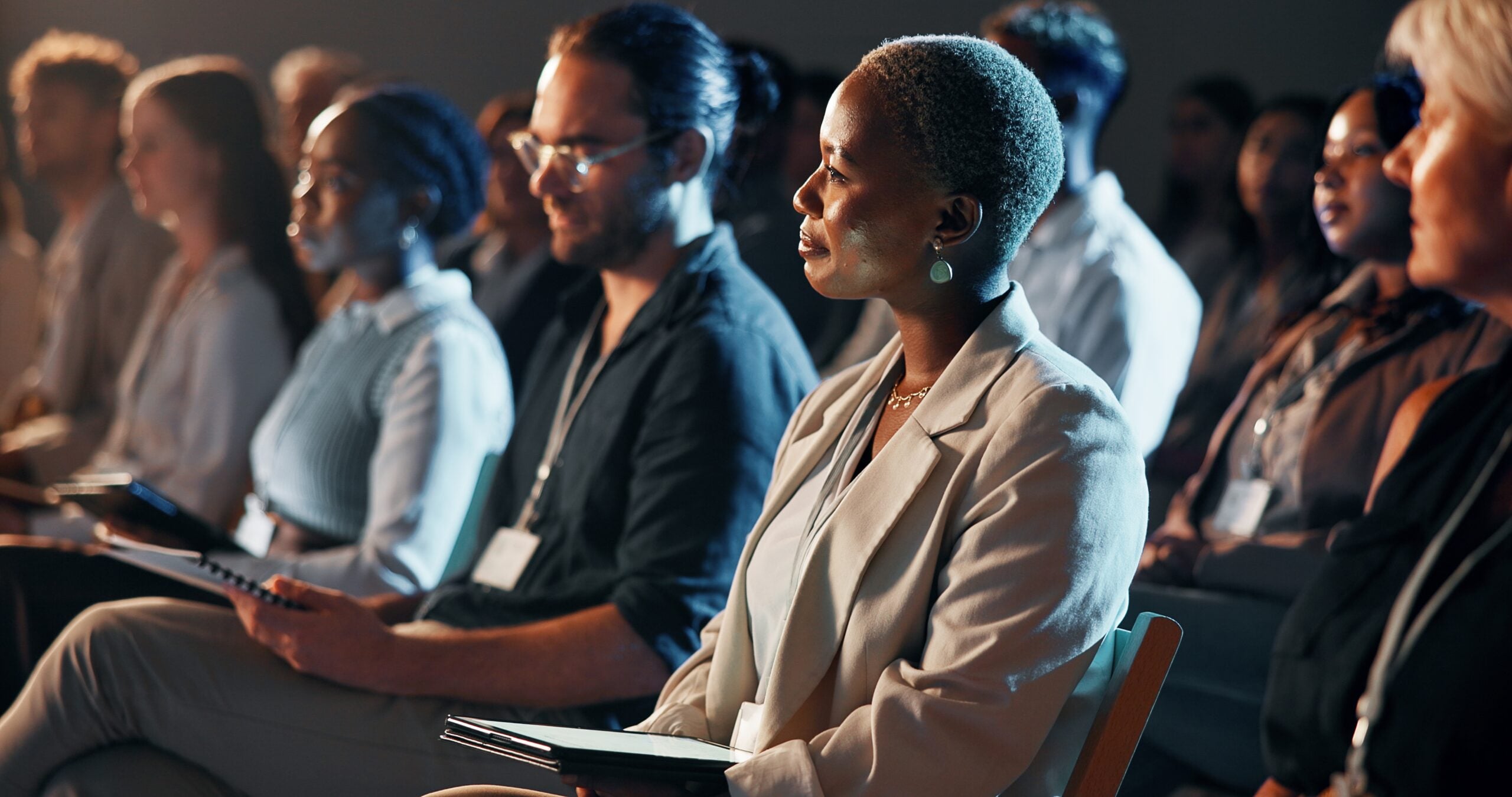 People attend a conference (Shutterstock)