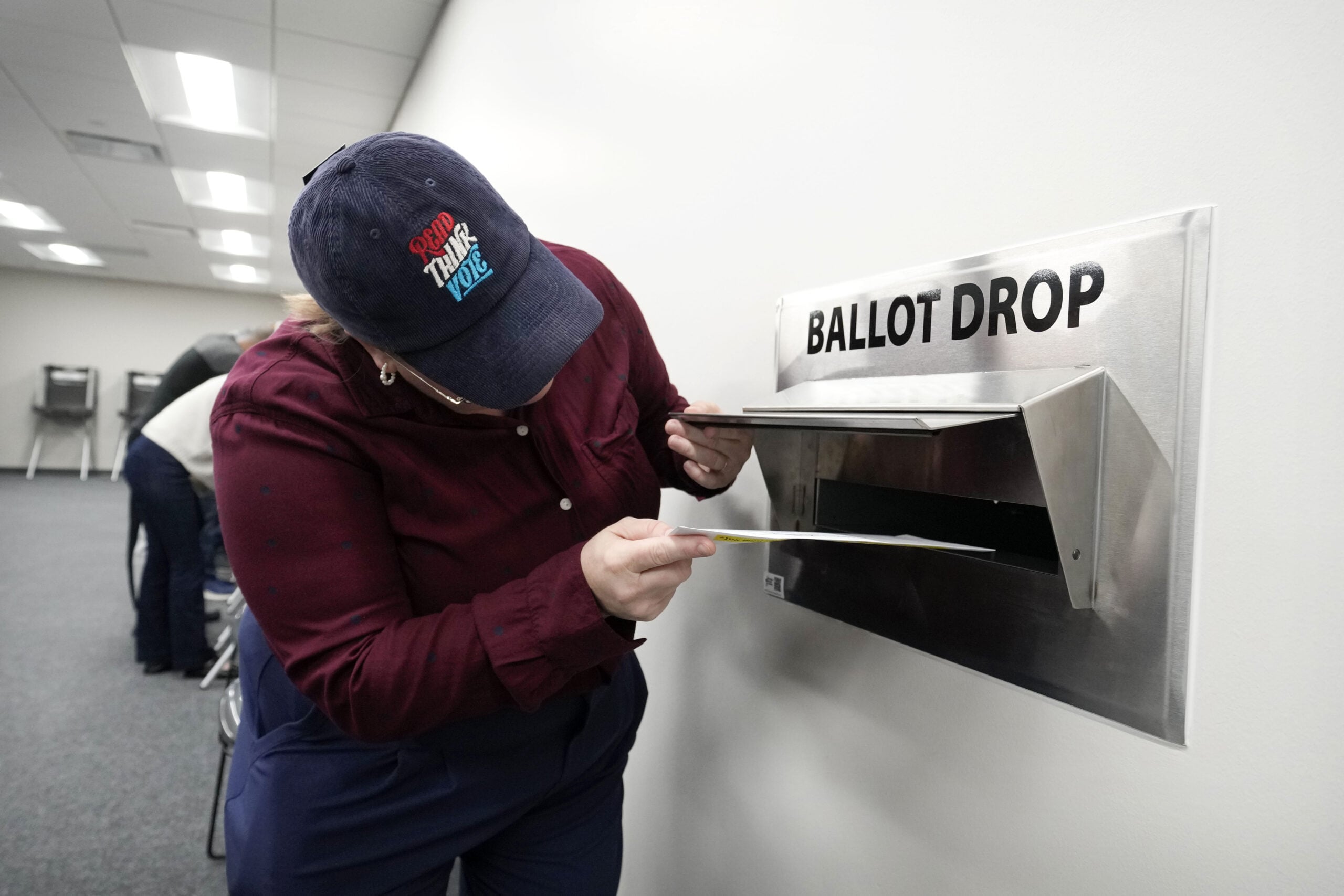 DES MOINES, IOWA - OCTOBER 14: Heather Jones-Brown, of Des Moines, Iowa, casts her ballot during early voting at the Polk County Election Office on October 14, 2026 in Des Moines, Iowa. Wednesday was the first day Iowans could cast an early in-person ballot in the general election.(Photo by Charlie Neibergall/Getty Images)