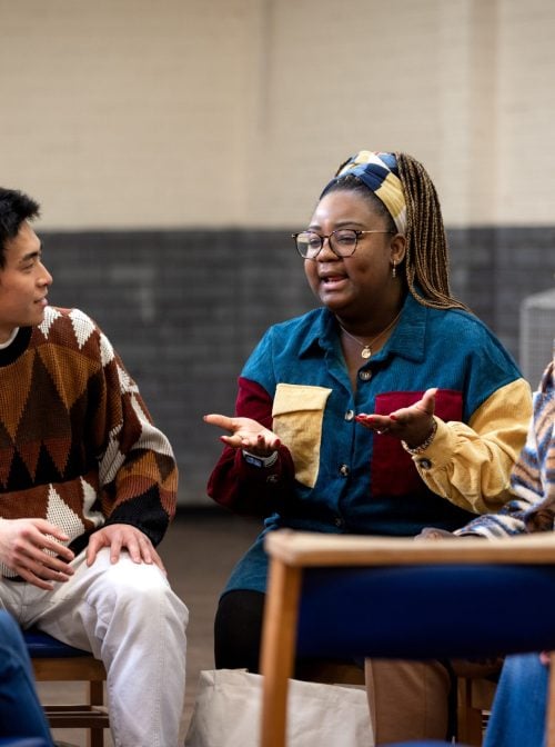 Group talking to each other. (SolStock/Getty Images)