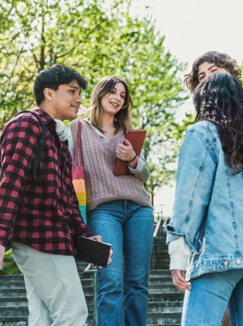 Conversations between friends on a college campus. (Giuseppe Lombardo/iStock/Getty Images Plus)