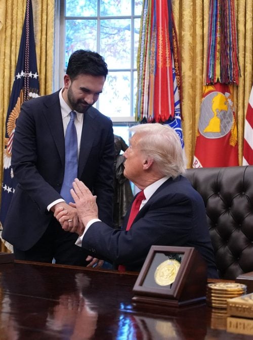 WASHINGTON, DC - NOVEMBER 21: U.S. President Donald Trump shakes hands with New York City Mayor-elect Zohran Mamdani (L) during a meeting in the Oval Office of the White House on November 21, 2025 in Washington, DC. Trump congratulated Mamdani on his election win as the two political opponents met to discuss policies for New York City, including affordability, public safety, and immigration enforcement. (Photo by Andrew Harnik/Getty Images)