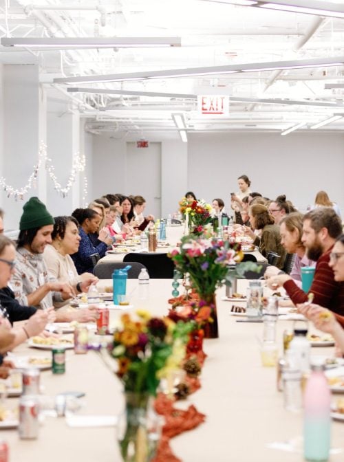 Interfaith America staff members enjoy each other's dishes at the annual Thanksgiving potluck. Photo by Kelly Feldmiller.