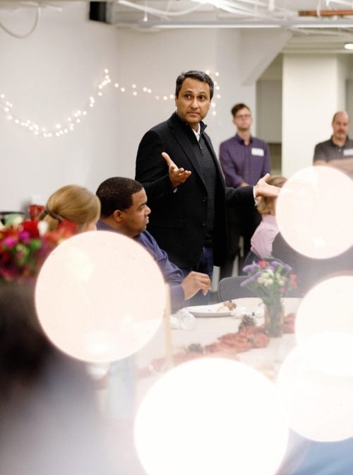 Eboo Patel speaking at the 2024 Interfaith America Thanksgiving Potluck.