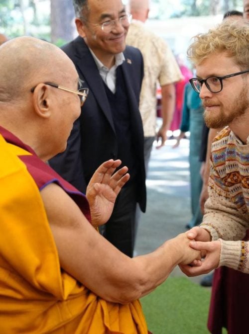Chris Scammell, right, co-founder of the Buddhism & AI Initiative, meets the Dalai Lama, left, at the 2025 Mind & Life Dialogue— “Minds, Artificial Intelligence, and Ethics”— in Oct. 2025 in Dharamsala, India. (Photo courtesy of Chris Scammell)