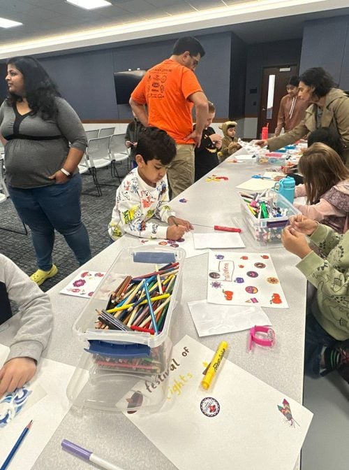 Youth enjoy a craft table during a Diwaloween celebration in Shelby Township, Michigan. (Photo courtesy Shilpa Mankikar)